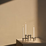 Candelabro de tela para uñas